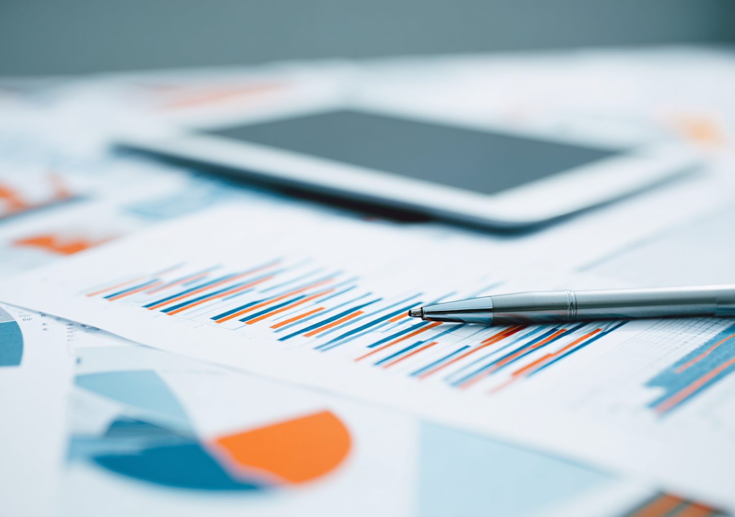 A confident individual reviewing their crypto tax reports and documents, representing the peace of mind achieved through diligent planning and tool usage.